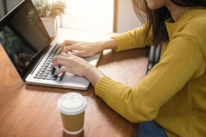 blogging on laptop computer